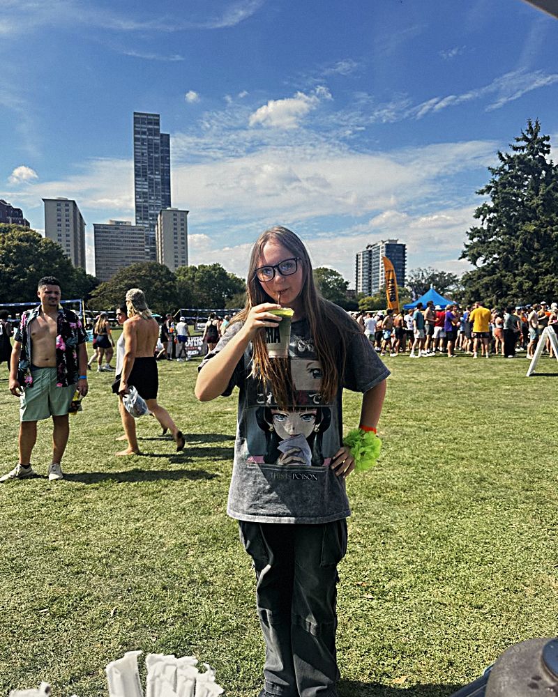 A guest sipping matcha at the Chicago Luau
